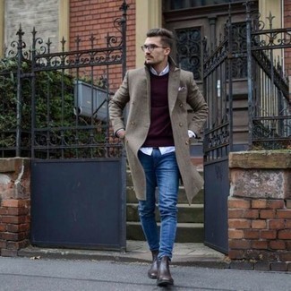 Burgundy Crew-neck Sweater Outfits For Men: Effortlessly blurring the line between cool and laid-back, this pairing of a burgundy crew-neck sweater and blue jeans is bound to become one of your favorites. Give an added dose of refinement to this look by sporting a pair of dark brown leather chelsea boots.