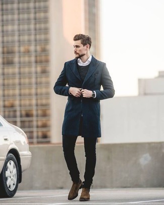 Navy Vertical Striped Overcoat Outfits: This combo of a navy vertical striped overcoat and black jeans looks considered and immediately makes any man look cool. Don't know how to complete this getup? Wear a pair of brown suede chelsea boots to dial it up.