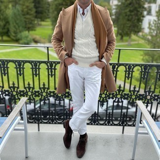 Camel Overcoat Outfits: This combo of a camel overcoat and white jeans is hard proof that a safe look can still be really dapper. Finishing with a pair of dark brown suede desert boots is a fail-safe way to infuse a hint of stylish effortlessness into your look.
