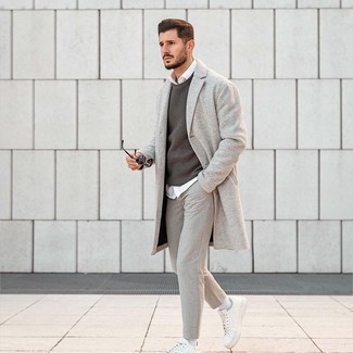 Grey Overcoat Outfits: For a casually smart getup, make a grey overcoat and grey chinos your outfit choice — these two items work perfectly well together. And if you need to instantly play down your look with one item, why not complement your look with white canvas low top sneakers?