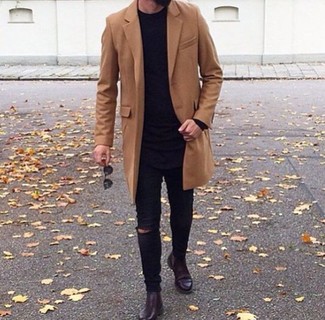 Black Crew-neck Sweater Outfits For Men: Marrying a black crew-neck sweater with black ripped skinny jeans is a nice choice for a casually dapper outfit. For a more polished touch, add a pair of burgundy leather chelsea boots to the mix.