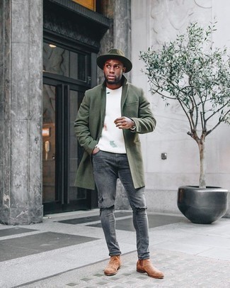 Grey Ripped Jeans Outfits For Men: You're looking at the solid proof that an olive overcoat and grey ripped jeans look awesome when paired together in a relaxed casual menswear style. In the footwear department, go for something on the smarter end of the spectrum by rocking a pair of tobacco suede chelsea boots.
