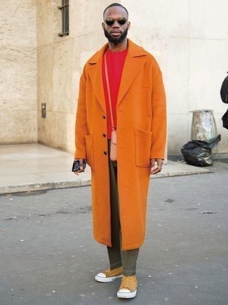 Men's Outfits 2022: Ramp up your casual style game in this combination of an orange overcoat and olive chinos. You can get a little creative on the shoe front and add yellow canvas high top sneakers to the equation.