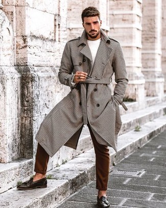 Brown Chinos Chill Weather Outfits: For an outfit that's casually sleek and camera-worthy, dress in a grey check overcoat and brown chinos. Introduce a pair of dark brown leather tassel loafers to this ensemble to easily rev up the fashion factor of your look.