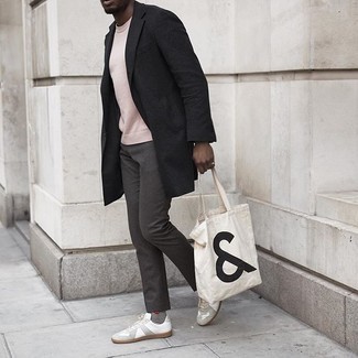 White Print Canvas Tote Bag Outfits For Men: A black overcoat and a white print canvas tote bag are true essentials if you're putting together a casual wardrobe that matches up to the highest fashion standards. Our favorite of a multitude of ways to round off this look is with a pair of white canvas low top sneakers.