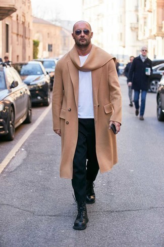 Black Leather Casual Boots Outfits For Men: This combination of a camel overcoat and black chinos is undeniable proof that a simple look doesn't have to be boring. Complete this outfit with black leather casual boots and the whole ensemble will come together.