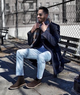 Multi colored Check Scarf Outfits For Men: A big thumbs up to this off-duty combo of a navy check overcoat and a multi colored check scarf! Not sure how to finish off this look? Wear dark brown suede chelsea boots to spruce it up.