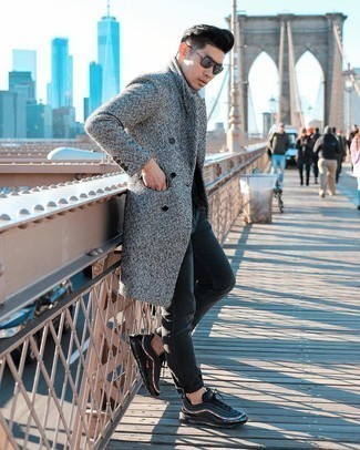 Grey Herringbone Overcoat Outfits: This outfit with a grey herringbone overcoat and navy jeans isn't super hard to put together and easy to adapt. And if you want to immediately play down this ensemble with one item, why not introduce a pair of black athletic shoes to the mix?