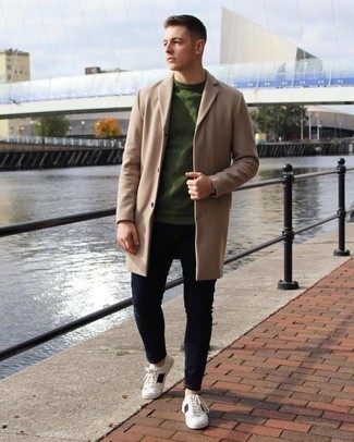 Camel Overcoat Outfits: A camel overcoat and navy jeans will add serious style to your daily lineup. Does this outfit feel all-too-polished? Invite white and navy canvas low top sneakers to switch things up.