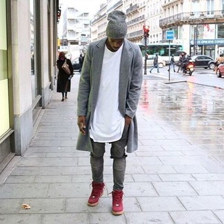 Red High Top Sneakers Outfits For Men: Consider wearing a grey overcoat and grey ripped skinny jeans to feel completely confident in yourself and look casually dapper. Introduce red high top sneakers to your outfit to avoid looking too polished.