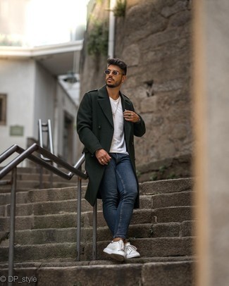 Men's Dark Green Overcoat, White Crew-neck T-shirt, Navy Skinny Jeans, White and Navy Leather Low Top Sneakers