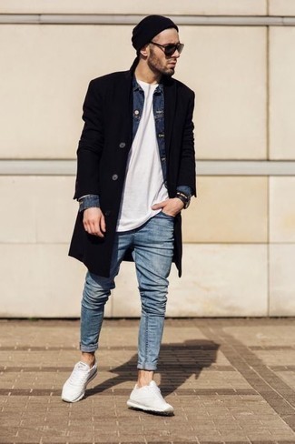 Black Overcoat Outfits: You'll be surprised at how easy it is for any guy to throw together this semi-casual outfit. Just a black overcoat paired with light blue jeans. Go ahead and complement your outfit with white athletic shoes for a touch of stylish casualness.