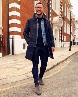 Navy Skinny Jeans Smart Casual Outfits For Men: Perfect off-duty by wearing a navy plaid overcoat and navy skinny jeans. Take a classic approach with footwear and complement this look with a pair of brown suede chelsea boots.