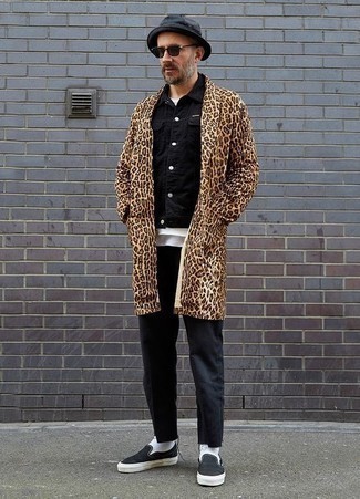 Black Canvas Slip-on Sneakers Outfits For Men: Choose a beige leopard overcoat and black jeans to achieve a proper and sophisticated outfit. Send your ensemble in a sportier direction by finishing off with a pair of black canvas slip-on sneakers.
