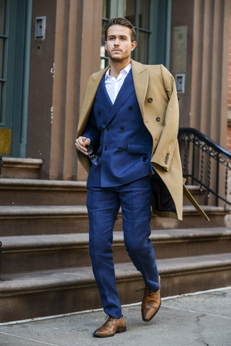 Marrying a camel overcoat and blue dress pants is a guaranteed way to infuse your wardrobe with some masculine elegance. Rev up your getup by rocking brown leather derby shoes.