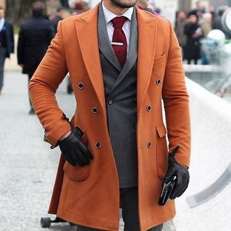 Orange Overcoat Outfits: For a look that's elegant and truly wow-worthy, team an orange overcoat with charcoal dress pants.