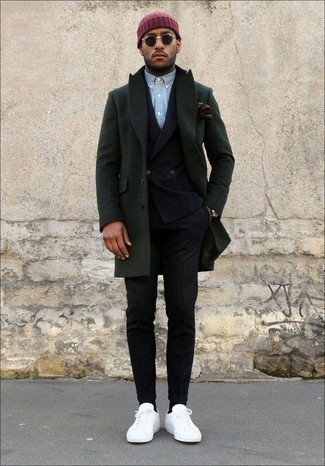 Red Beanie Outfits For Men: If it's ease and practicality that you're looking for in an outfit, try teaming a dark green overcoat with a red beanie. Let your styling savvy truly shine by finishing your look with a pair of white leather low top sneakers.