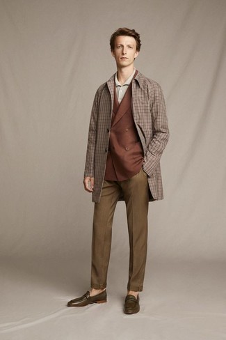 Dress Pants Outfits For Men: You'll be surprised at how easy it is to get dressed like this. Just a brown check overcoat teamed with dress pants. If not sure about what to wear in the shoe department, go with a pair of olive leather loafers.
