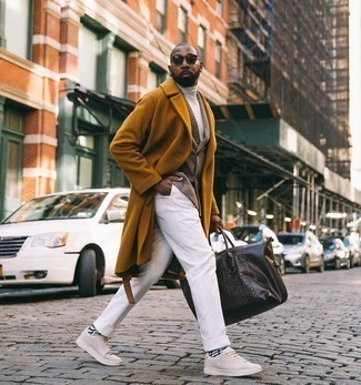 Tobacco Overcoat Outfits: This pairing of a tobacco overcoat and white chinos is truly jaw-dropping, but it's extremely easy to put together. For a more laid-back take, why not introduce beige leather low top sneakers to the equation?