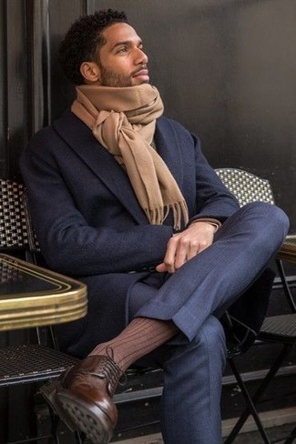 Tan Scarf Outfits For Men: If you’re a jeans-and-a-tee kind of guy, you'll like this straightforward but cool and casual combination of a navy overcoat and a tan scarf. Why not add a pair of dark brown leather casual boots to this outfit for an air of elegance?