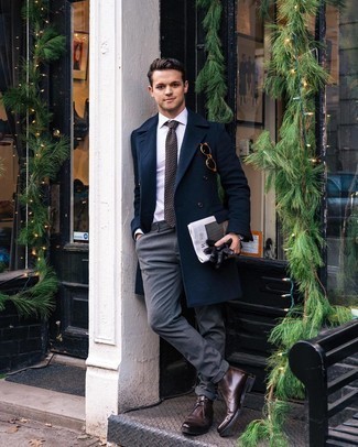 Brown Print Tie Outfits For Men: Undeniable proof that a navy overcoat and a brown print tie are amazing when paired together in a polished ensemble for a modern man. Hesitant about how to round off? Complete this ensemble with a pair of dark brown leather desert boots for a more relaxed take.