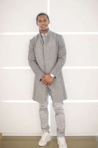 Victor Cruz wearing Grey Overcoat, White Dress Shirt, Grey Dress Pants, White Leather Low Top Sneakers