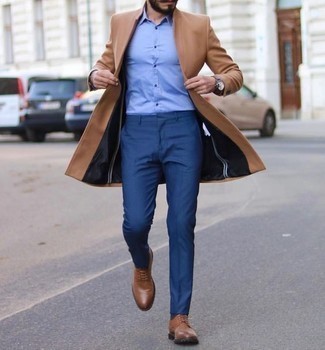 Camel Overcoat Dressy Outfits: We love the way this combination of a camel overcoat and blue dress pants instantly makes men look elegant and sharp. As for the shoes, you can stick to the casual route with a pair of brown leather derby shoes.