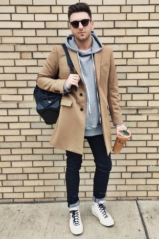 Black Backpack Outfits For Men: Go for a pared down but casually cool look pairing a camel overcoat and a black backpack. A pair of white high top sneakers is a savvy option to finish this ensemble.