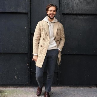 Beige Quilted Overcoat Outfits: This polished combination of a beige quilted overcoat and charcoal dress pants is a common choice among the fashion-savvy chaps. A pair of brown leather casual boots instantly steps up the cool of your getup.