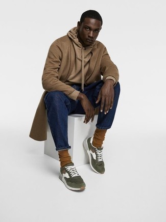 Brown Overcoat Outfits: This combination of a brown overcoat and navy jeans is a never-failing option when you need to look sharp but have no time. Want to go easy on the shoe front? Complete your ensemble with a pair of olive athletic shoes for the day.