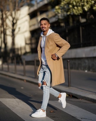 Light Blue Ripped Skinny Jeans Outfits For Men: A camel overcoat and light blue ripped skinny jeans? It's an easy-to-wear outfit that you could sport on a day-to-day basis. A pair of white leather low top sneakers is a smart option to complete this look.