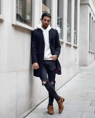 Black and White Skinny Jeans Outfits For Men: A navy overcoat and black and white skinny jeans paired together are the perfect look for gentlemen who love casual styles. Feeling bold? Change things up a bit by rounding off with brown suede chelsea boots.