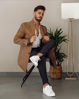 Charcoal Vertical Striped Chinos Outfits: This combination of a camel overcoat and charcoal vertical striped chinos looks amazing, but it's also very easy to recreate. A pair of white leather low top sneakers will add a little edge to your ensemble.