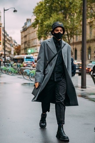 Black Bucket Hat Outfits For Men: A grey overcoat and a black bucket hat worn together are a match made in heaven. Balance this outfit with a more elegant kind of footwear, like this pair of black leather chelsea boots.