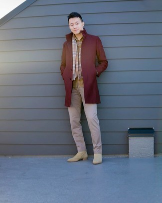Tan Long Sleeve Shirt Outfits For Men: Flaunt your chops in men's fashion by opting for this casual pairing of a tan long sleeve shirt and beige chinos. Upgrade this outfit with a pair of beige suede chelsea boots.
