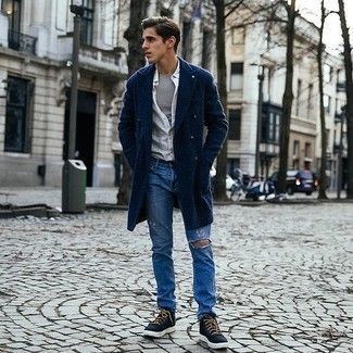 Navy Ripped Jeans Outfits For Men: Reach for a navy overcoat and navy ripped jeans for a relaxed and fashionable look. Add a pair of navy canvas high top sneakers to the equation to make a dressy outfit feel suddenly edgier.