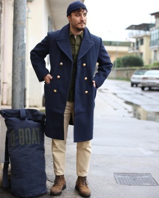 Navy Beanie Outfits For Men: A navy overcoat and a navy beanie are a cool combo worth having in your day-to-day casual rotation. Finishing off with brown suede casual boots is a simple way to bring a dose of polish to this ensemble.