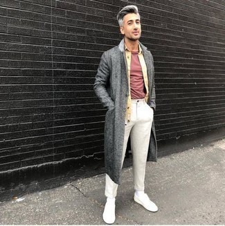 Beige Chinos Cold Weather Outfits: Up your style game by opting for a grey overcoat and beige chinos. Feel somewhat uninspired with this look? Let a pair of white canvas low top sneakers switch things up.