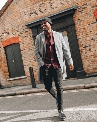 Burgundy Long Sleeve Shirt Outfits For Men: Teaming a burgundy long sleeve shirt and black jeans will prove your skills in men's fashion even on lazy days. Let your styling savvy truly shine by finishing off this look with a pair of black leather chelsea boots.