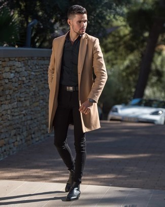 Camel Overcoat Fall Outfits: A camel overcoat and black skinny jeans make for the perfect base for a variety of stylish combinations. If you feel like stepping it up a bit, complete this look with a pair of black leather chelsea boots. This combination is an excellent choice if you're on the hunt for a cool summer-to-fall outfit.