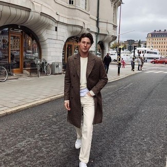 White Low Top Sneakers with Overcoat Casual Outfits: For a casually neat menswear style, choose an overcoat and beige jeans — these pieces work really good together. Complete this ensemble with a pair of white low top sneakers to immediately dial up the fashion factor of this outfit.