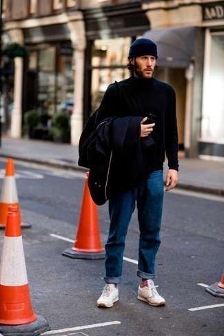 Black Canvas Tote Bag Outfits For Men: For a laid-back look, reach for a navy overcoat and a black canvas tote bag — these two items go perfectly well together. A pair of white athletic shoes effortlessly revs up the wow factor of your outfit.