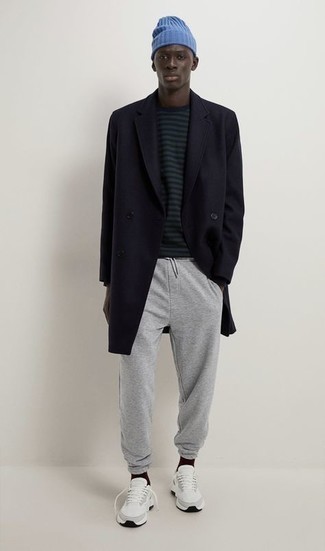 Sweatpants Outfits For Men: This is solid proof that a black overcoat and sweatpants look awesome when paired together in a casual menswear style. If you need to instantly dial down this outfit with shoes, why not complement this outfit with white athletic shoes?