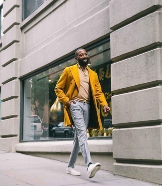 Mustard Overcoat Outfits: So as you can see, looking effortlessly refined doesn't require that much effort. Just wear a mustard overcoat and grey vertical striped chinos and you'll look amazing. For something more on the daring side to finish your look, complete your look with white canvas low top sneakers.