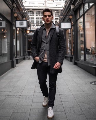 Charcoal Wool Shirt Jacket Outfits For Men: This combination of a charcoal wool shirt jacket and black jeans looks pulled together and makes any gent look instantly cooler. Feeling transgressive today? Mix things up with white canvas low top sneakers.