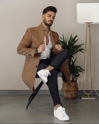 White Leather Low Top Sneakers Cold Weather Outfits For Men: For an effortlessly neat menswear style, choose a camel overcoat and charcoal vertical striped chinos — these two pieces play nicely together. Showcase your fun side by finishing with a pair of white leather low top sneakers.