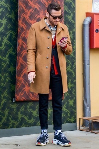 Red Cardigan Chill Weather Outfits For Men: A red cardigan and a camel overcoat are absolute staples if you're picking out a smart wardrobe that matches up to the highest menswear standards. Complement your ensemble with a pair of navy and white athletic shoes to immediately boost the fashion factor of your look.