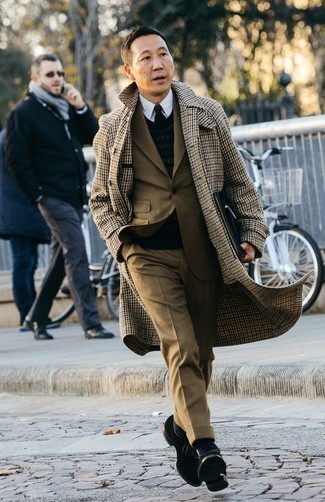 Brown Houndstooth Overcoat Outfits: A brown houndstooth overcoat and a tan suit are essential in any guy's closet. A pair of black suede derby shoes can integrate effortlessly within many ensembles.