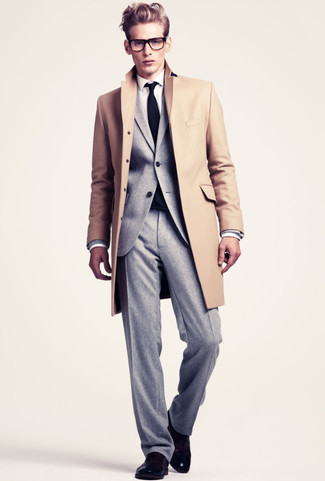 Grey Wool Suit Dressy Outfits: You're looking at the definitive proof that a grey wool suit and a camel overcoat are amazing when worn together in a sophisticated ensemble for a modern gentleman. For extra fashion points, throw black leather oxford shoes into the mix.
