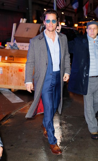 Matthew McConaughey wearing Grey Herringbone Overcoat, Blue Suit, Light Blue Vertical Striped Dress Shirt, Brown Leather Derby Shoes